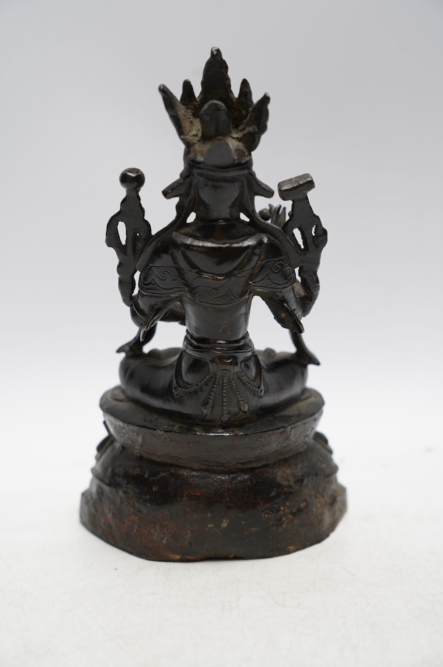 A Chinese lacquered bronze figure of Bodhisattva, 19cm. Condition - fair